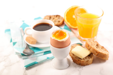 Fototapeta na wymiar breakfast with egg,coffee and fruit
