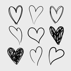 Vector set of doodle hand drawn isolated hearts icons. Design elements