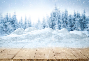 Table background with snow and free space for your decoration 