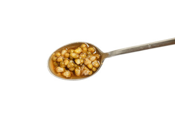 Spoonful of Mung beans over white background