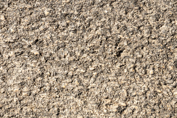 Stone background. Antique Granite stone bush hamered Outdoor wheathered