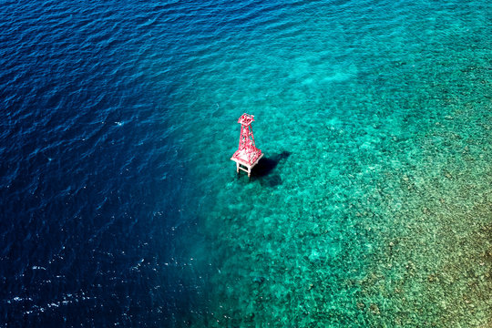 Aerial view of a Small light house, Badas harbor, Sumbawa, Indonesia