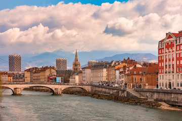 Fototapeta na wymiar Church, Isere river and bridge in Grenoble, France