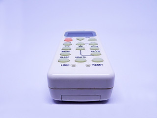 Simple and small air condition remote control isolated on white background. 