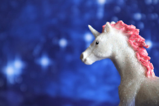 magical unicorn on a blue backgroun