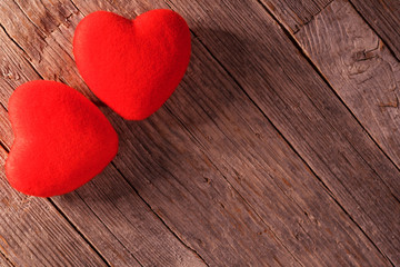 Valentine's day, red  hearts on old wooden floor