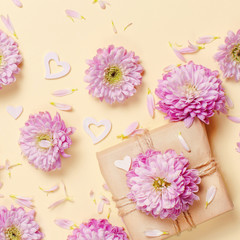 Flowers composition with hearts and gift box