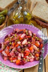 Russian traditional salad vinegret or vinaigrette with diced cooked vegetables