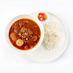 Thai Massaman Curry in a bowl and rice , Thai coconut milk curry