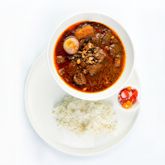Thai Massaman Curry in a bowl and rice , Thai coconut milk curry