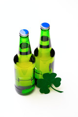 Two buttle of green beer on white background