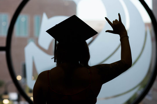 silhouette of girl sign language