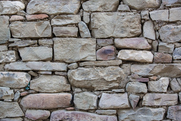 old stone wall of stones