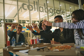 Students hanging out at university campus cafe