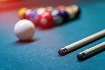 Billiard balls in triangle with cue on table