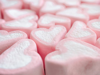 Pink marshmallow close up background, Many hearts marshmallows closeup, Sweets in the form of hearts of marshmallow. Valentine's Day Gift