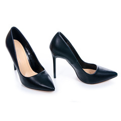 Female black high heels shoes on a white background. Isolation