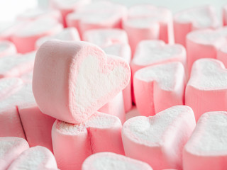 Pink marshmallow close up background, Many hearts marshmallows closeup, Sweets in the form of hearts of marshmallow. Valentine's Day Gift