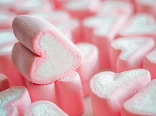 Pink marshmallow close up background, Many hearts marshmallows closeup, Sweets in the form of hearts of marshmallow. Valentine's Day Gift