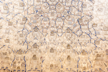 Detail of Alhambra UNESCO site in Granada - South of Spain. 600 years old arabic characters