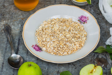 oatmeal, oat flakes, coffee for breakfast (table set). Top Food background