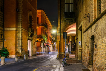 Old narrow street in Bologna, Emilia Romagna, Italy