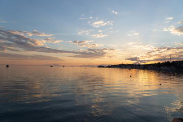 sunset on the pier of pedra de guaratiba, rio de janeiro, brazil