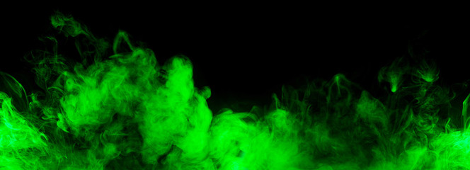 green smoke along black background - 243723138