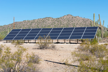 Solar panels on a hill side in the desert