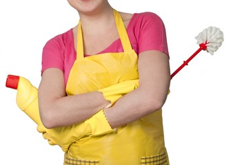 Female using Yellow cleaning gloves with a brush isolated on