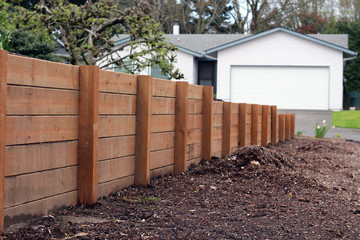 Horizontal sturdy retaining wall in yard for erosion and separation