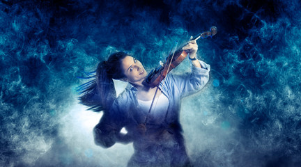 Fototapeta na wymiar Woman playing violin