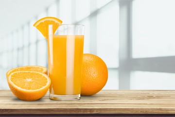 Orange juice and slices of orange on background © BillionPhotos.com