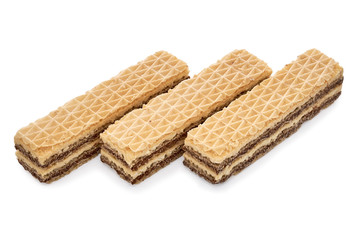 Three wafer biscuits isolated on white backdrop. closeup view