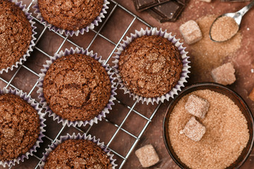 Chocolate muffins with Demerara sugar and cinnamon close-up. Selective focus