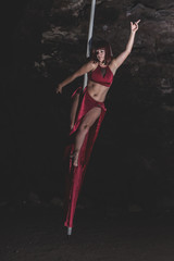 Woman practicing pole dance