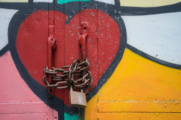 red heart on a closed door