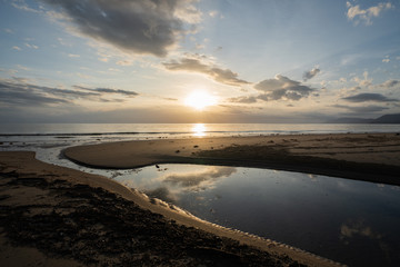 Reflection on 4 mile beach Port Douglas in Queensland Australia