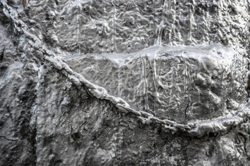 Chain on a painted wall.