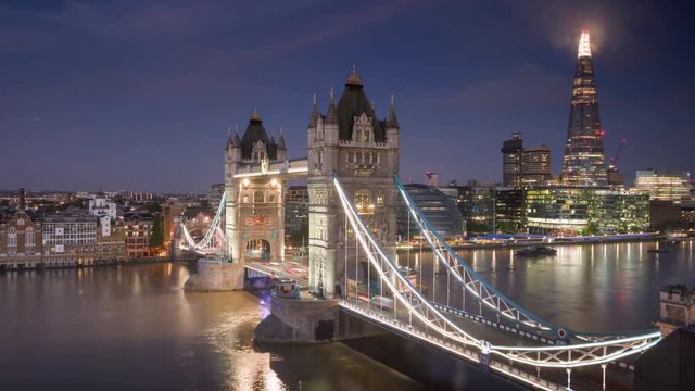 time lapse London skyline with illuminated Tower bridge in sunrise time, UK