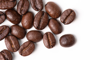 Macro of coffee beans on white background. Selective focus