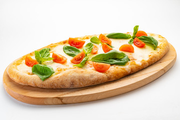 pizza with cherry tomatoes and basil
