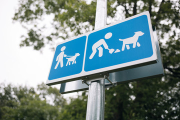 Clean up after dog sign