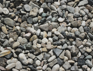 Pebbles on the beach background