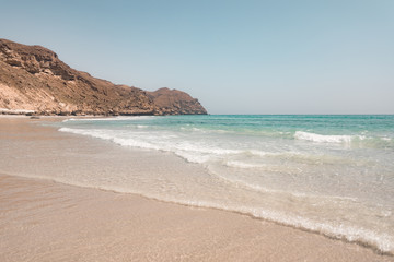 waves rolling on the beach