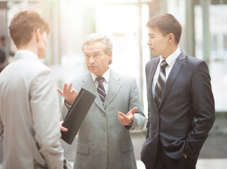 Fototapeta premium Director and business team to discuss the presentation of a new financial project in a modern office