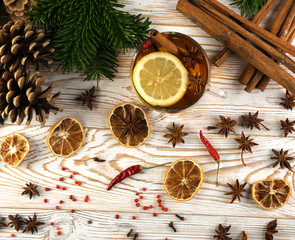 Winter drink with spices on festive new year background
