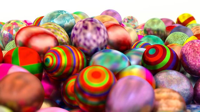 Animated rotating around of fallen Easter or colorful glossy eggs with texture lying on white base and against white background. Full 360 degree spin and loop able.