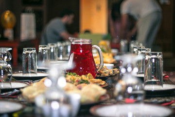 Red mors in a jug a middle eastern served table in cafe © Roman