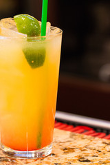 closeup of refreshing cocktail with lime 